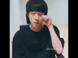 Rubbing his eyes frequently