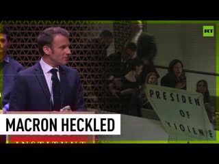 'where is french democracy?’ macron heckled during speech in the hague
