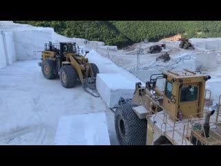 Komatsu wa900 and cat 992d wheel loaders at the edge birros marbles