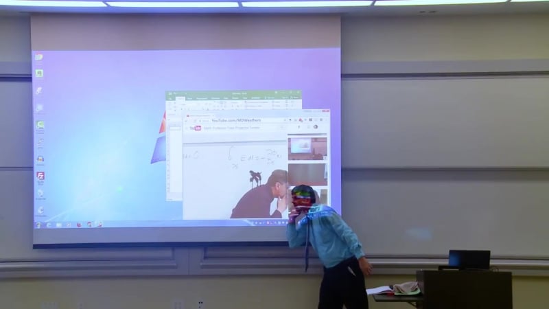 Math professor fixes projector screen (april fools prank)
