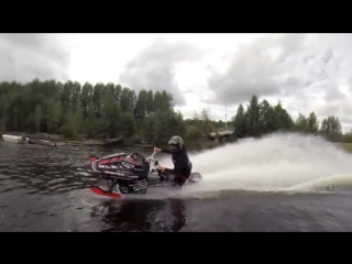 Snowmobile wheelies on water