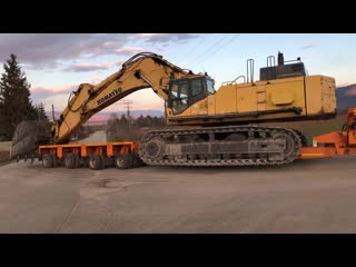 Loading and transporting the komatsu pc800 fasoulas heavy transports