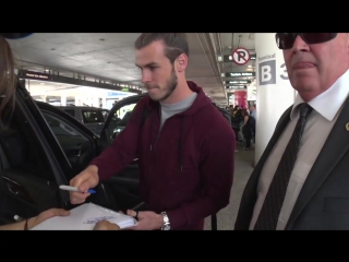 Real madrids gareth bale asked about manchester as he arrives in l a post champions league win