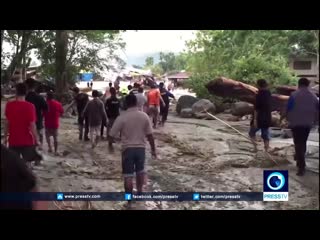 Indonesia flash floods porn at least 58, dozens missing