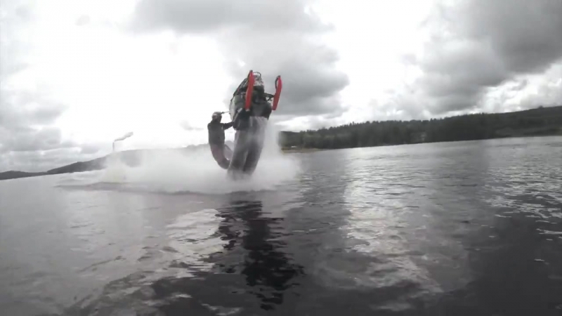 Snowmobile wheelies on water