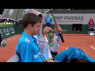 French open in the rain with novak djokovic