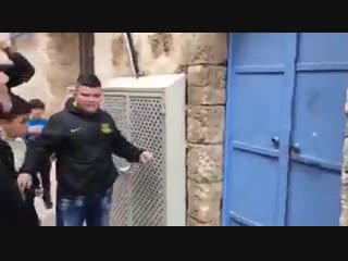 Palestinian woman cries after she was evicted from her house by israeli forces to let the settlers take over in jerusalem