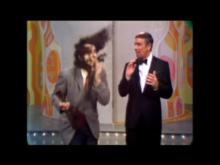 Tiny tim sings tiptoe through the tulips on laugh in in 1968