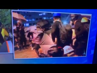 Protestors in hong kong using huge slingshot to shoot bricks at police dorm