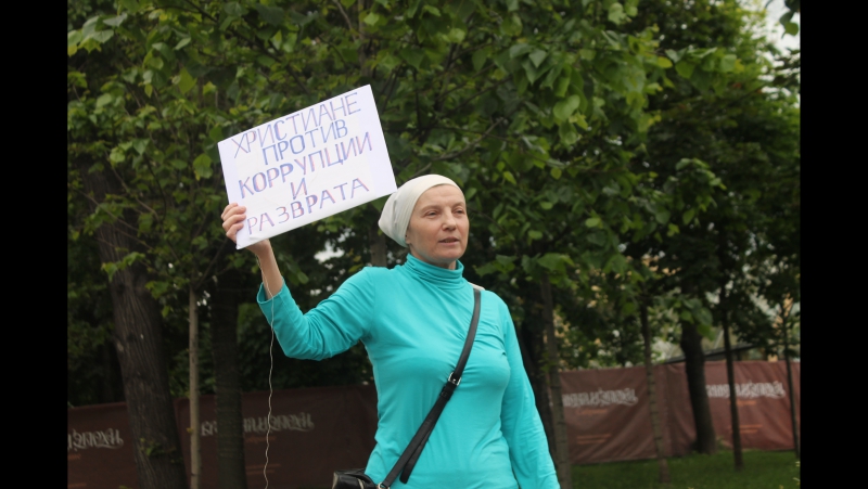 Задержание православной активиски на антикоррупционной акции