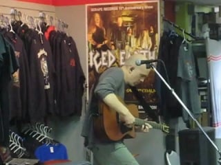 Devin townsend performing ki live at scrape records in vancouver