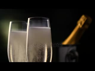 Depositphotos 168973682 stock video champagne two flutes with bottle mp4