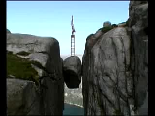 Amazing balance eskil balancing high on kjeragbolten lysefjorden norway