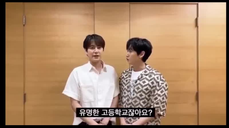 Kyuhyun and eunhyuk cheering on the yumkwang high school kyuhyuns high school students who