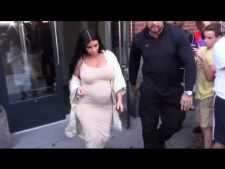 Pregnant kim kardashian squeezes curves into skintight dress in nyc