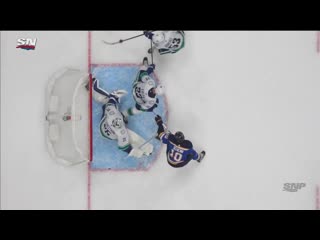 Jacob markstrom makes sprawling kick save after puck deflects off alexander edler