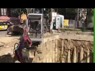 Excavator brand new first day on the job gets dropped down