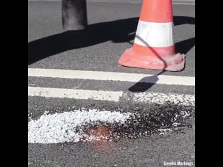 Filling and heating thermoplastic to repair the potholes of a road👷‍♂️