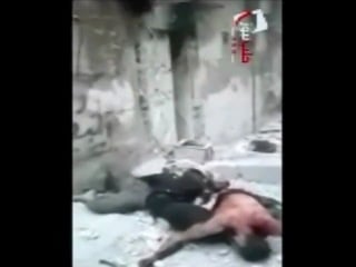 Fsa fighters corpses shot & thrown off the building like ragdolls