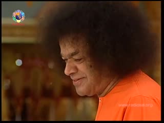 A gift from god sai darshan 297 swami distributing wrist watches on 21 nov 2000 75th birthday