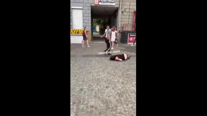 Gopnik migrant kick woman on european square in dnipro, ukraine, july 28 the sympathy in the girl of passers by is striking