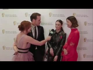 Sam, sophie and cait share a laugh with a reporter from ee