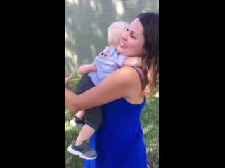 Baby hugs a stranger with the same disability