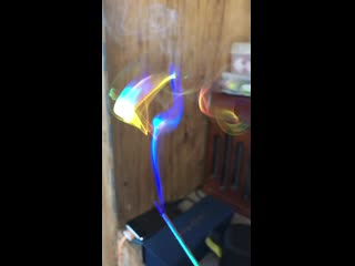 Trippy prism rainbow though incense smoke