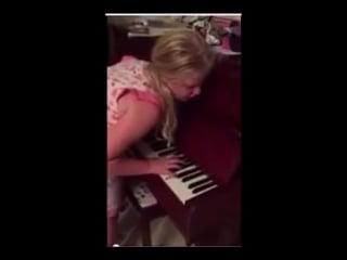 Young kiwi girl playing the piano while sleepwalking