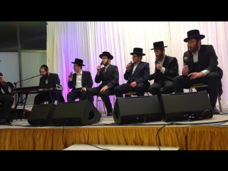 Motty ilowitz behar hamoriah with motty houchberg and chior at mesivte dinner in london