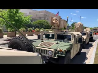 Large number of military humvees stationed in front of dc armory right now