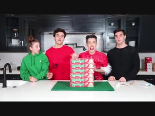 Sister squad builds a gingerbread dream house