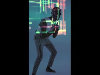 Mixkit a hipster dancing in front of a projection screen 2148