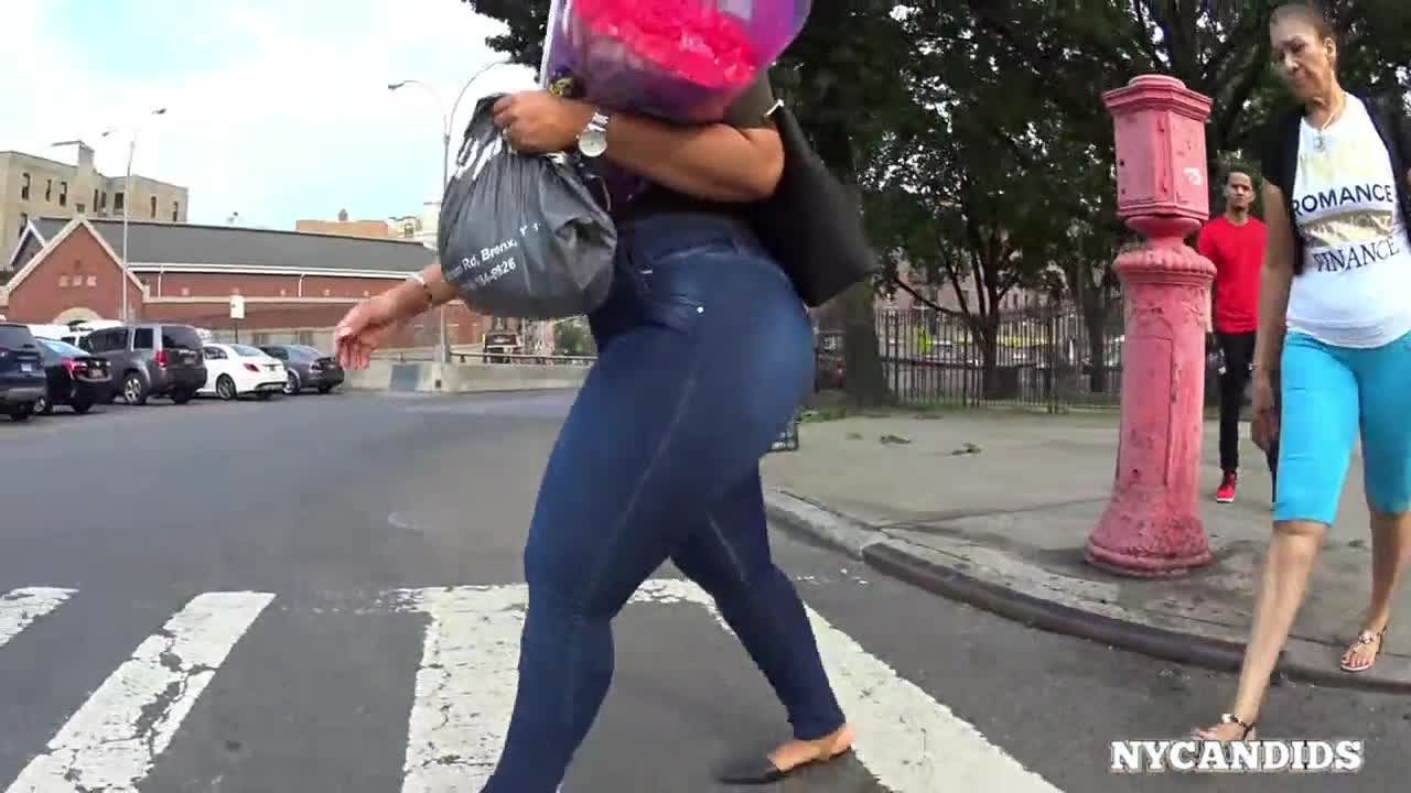 Latina with thick figure in dark jeans