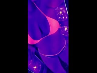 Busty woman in pink bikini