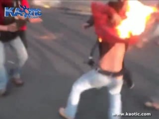 Instant karma when a protester lights himself on fire with his own molotov cocktail