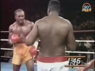 Evander holyfield vs larry holmes highlights