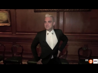 Robbie williams shares his secret dance moves with dermot for comic relief red nose day in this great video