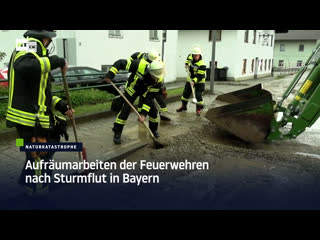 Aufräumarbeiten der feuerwehren nach sturmflut in bayern