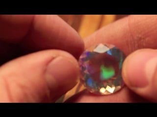 19ct rare 21mm round faceted water clear welo ethiopia crystal opal