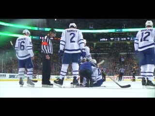 Rielly takes all of a chara slap shot to face