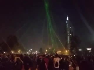 Chilean protesters take down a police drone with lasers!