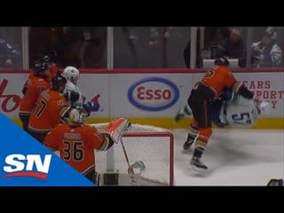 Tyler myers takes exception to hit on elias pettersson before josh manson jumps