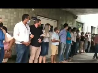 People shouting "murderer" to a doctor that will abort the baby of a 10y old girl that was porn brazil