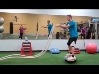 Balance training for standup paddle board fitness in the gym