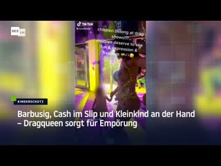 Barbusig, cash im slip und kleinkind an der hand – dragqueen sorgt für empörung