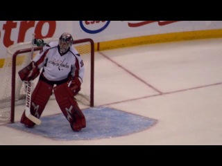 Tomas vokoun and michal neuvirth in action during the capitals @ senators hockey game