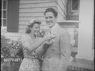 Billy conn and his new wife mary louise smith sit with boxing promoter mike jacobs