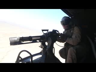 Impressively powerful m134 minigun in action aerial gunnery exercise