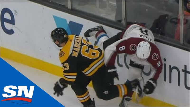 Cale makar leaves game with injury after hard hit from brad marchand